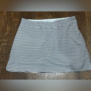 Casual skirt by Lola large. Black and white with shorts underneath.